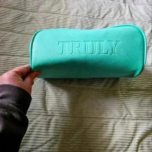 TRULY Los Angeles Cosmetcs bag. Mint green in color.